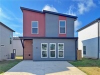 Building Photo - LEASING SPECIAL! 1/2 OFF FIRST MONTHS RENT - Featherston Village - Modern Living