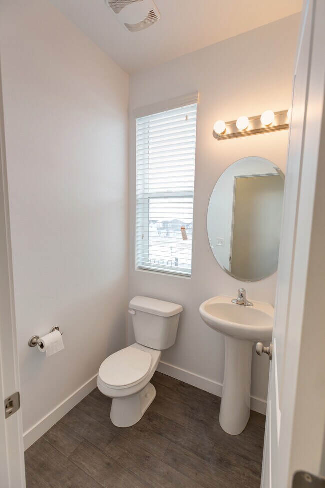 ground floor half bath - 3011 South Red Pine Drive