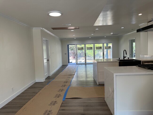 Open Concept home from family room to kitchen to living room - 1241 Elmer St