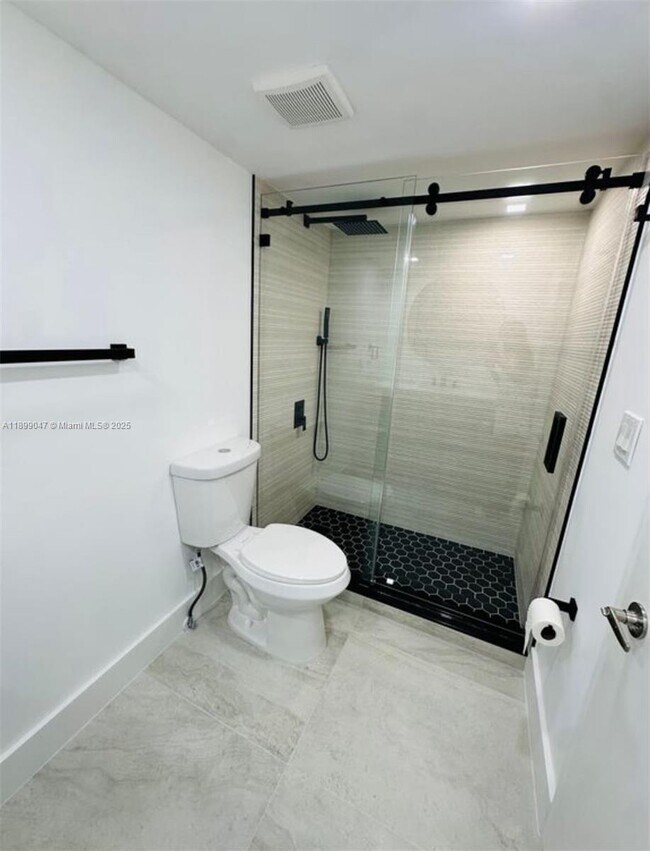 Building Photo - 5838 Collins Ave