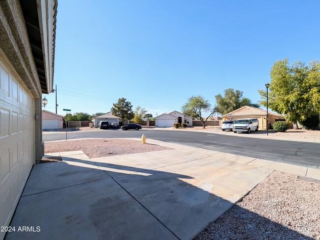 Building Photo - 7059 W Gardenia Ave