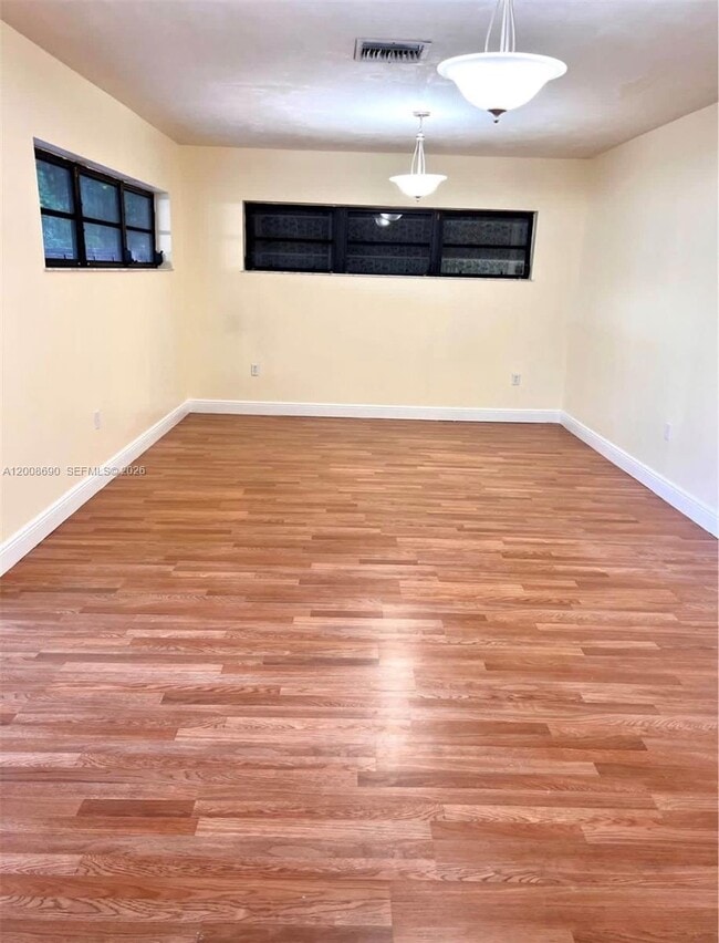 Building Photo - 10881 N Snapper Creek Dr