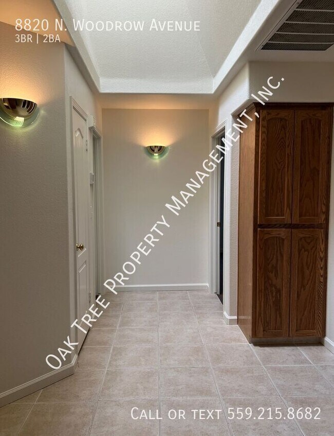 Building Photo - 8820 N Woodrow Ave