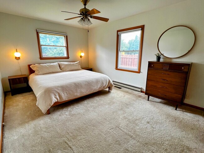 The primary bedroom has a new Tuft & Needle king mattress and blackout shades. - 228 W Lexington Blvd