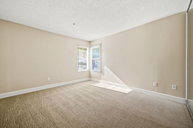 Building Photo - Upgraded Condo with Dual Masters in Gated Community in Orange