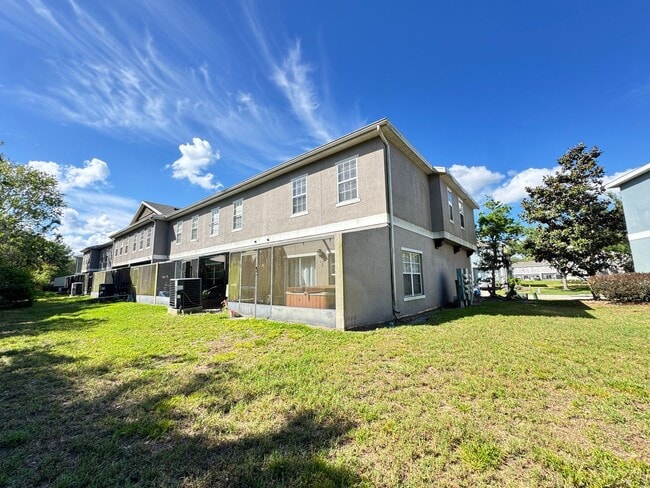 Building Photo - Fully Furnished 5-Bed End-Unit Townhome with Hot Tub in Gated Coral Cay! WASHER & DRYER INCLUDED!