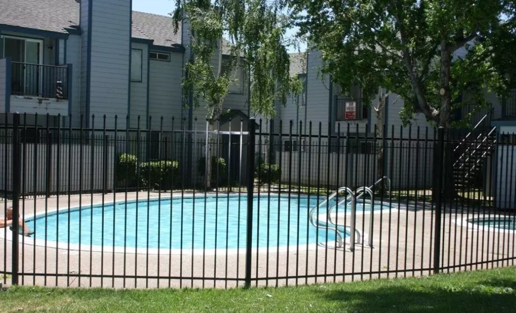 swimming pool with deck, spa not pictured but to the left - 445 Almond Dr. #29