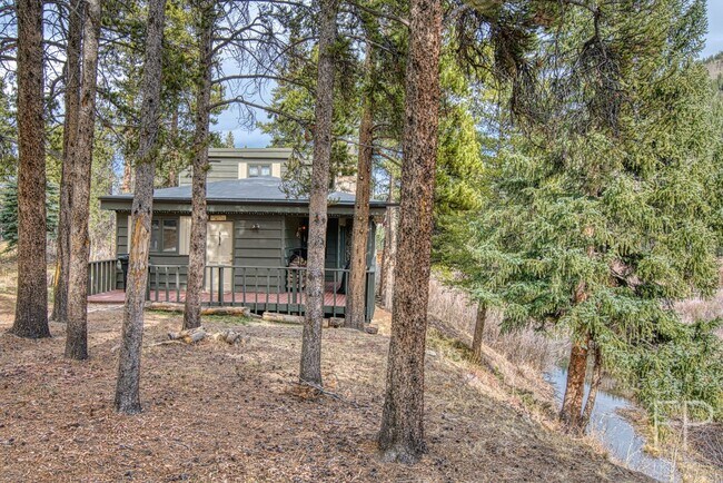 Building Photo - On the Blue River!  HUGE 4 Bedroom home, Furnished Updates throughout!  Bus route!  Spacious parking