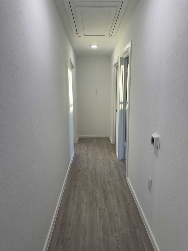 Hallway to Bedrooms - 13223 Faxon Pass