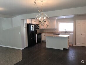 Building Photo - 4 bedroom, 2 bath Home