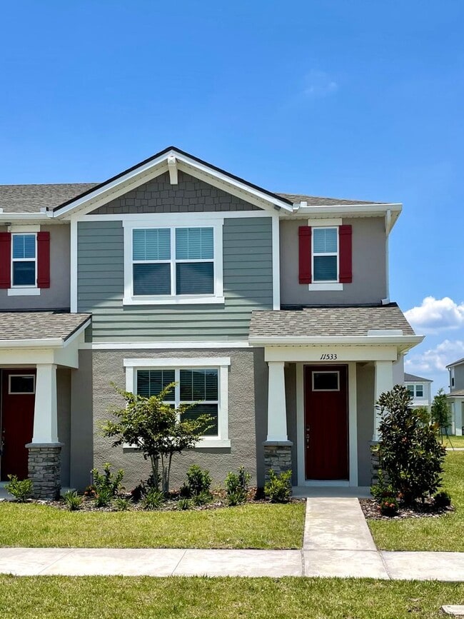 Primary Photo - Newer 4 Bedroom, 2.5 Bath Corner Unit Town...