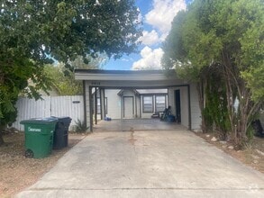 Building Photo - Large 2/2 duplex with a 2 car carport