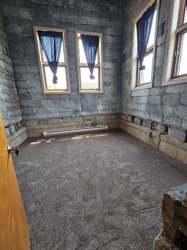 Building Photo - Unique 2 Bedroom Downtown Mount Clemens Loft with Updated Kitchen, Spacious Living Room, Balcony ...