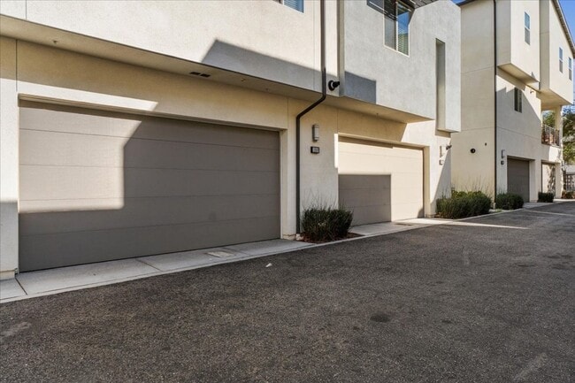 Building Photo - Modern 3-Bedroom Townhome with Luxe Finishes and Private Garage