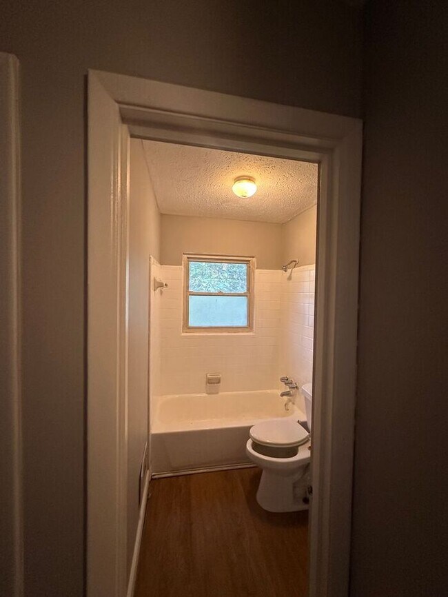 Building Photo - COMING SOON! Charming Split-Level Single-F...