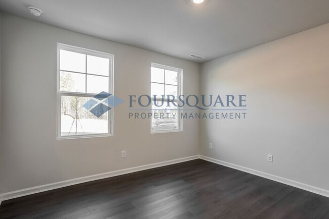 Building Photo - New Three-Story Townhome | 1st Level Guest...