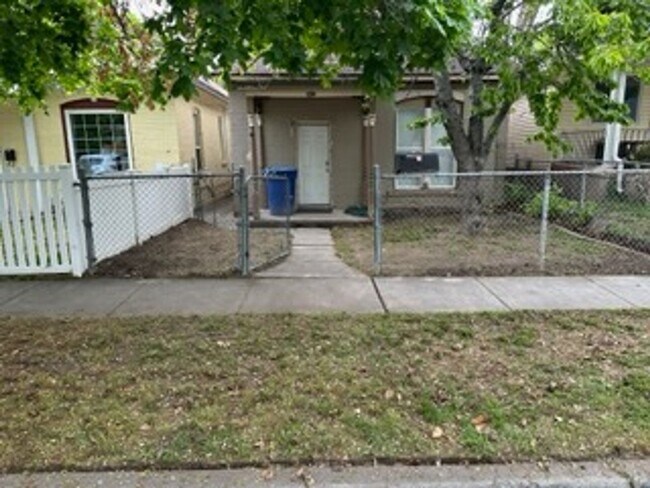 Building Photo - Liberty Park One Bedroom Single Family Home with Huge Yard