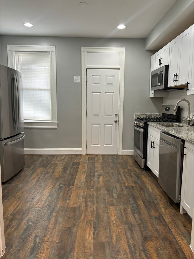 Building Photo - Beautifully Remodeled 2BR Home with Den and Finished Basement