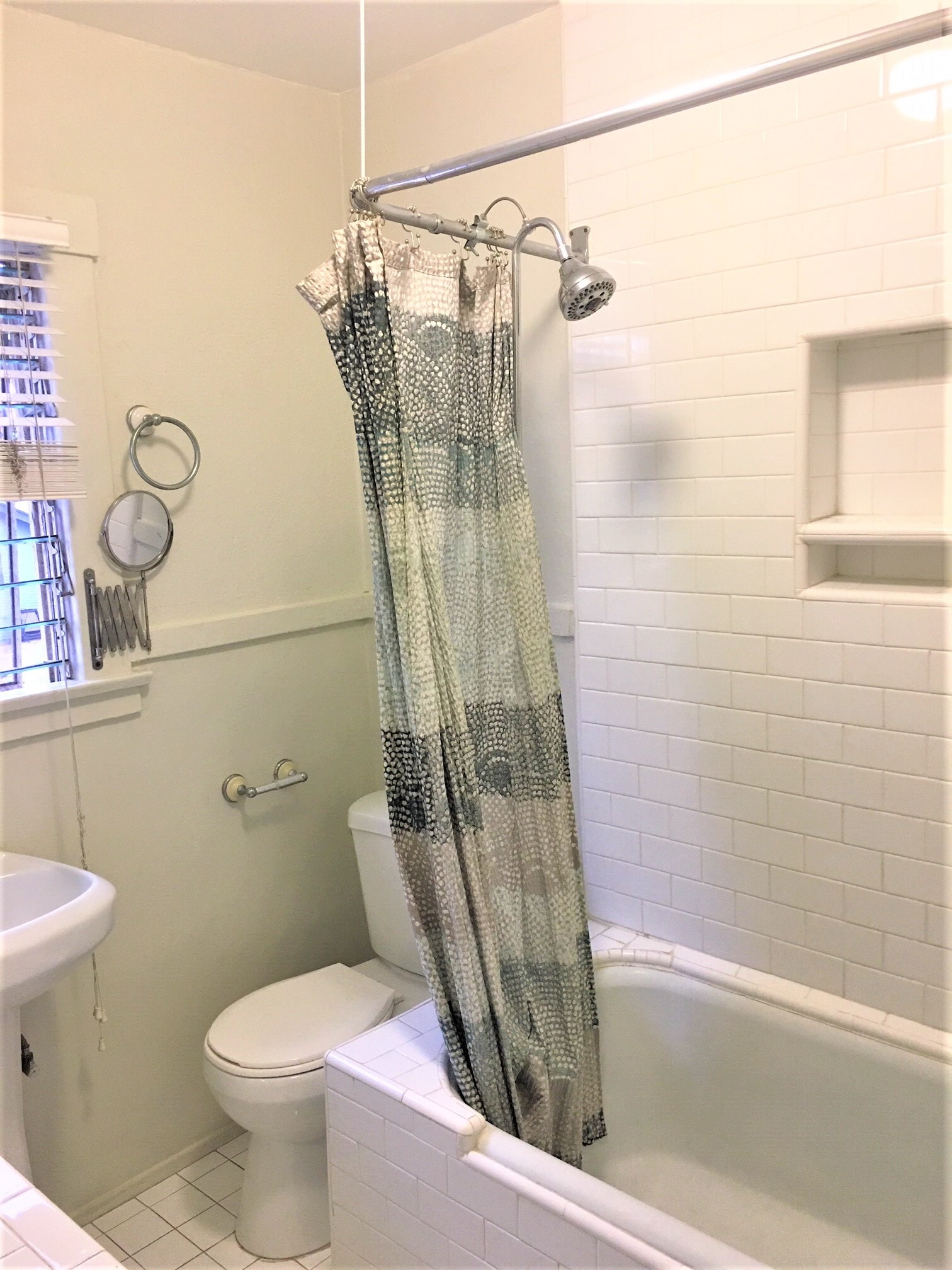 bathroom with tub and shower - 3047 E 6th St