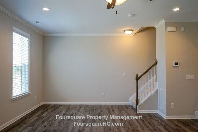 Building Photo - Modern 3-Story Townhome with Entry-Level Bonus Room, Back Deck & Garage , Community Pool in North...