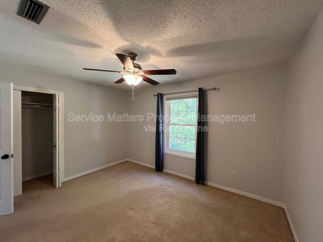 Building Photo - 6004 Players Pl