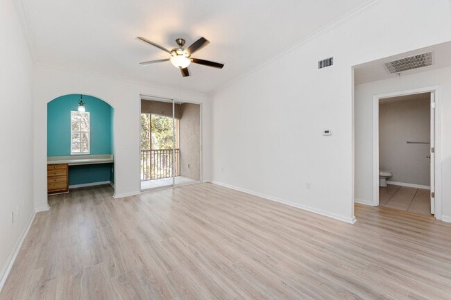 Building Photo - IMMACULATE 2nd Story condominium with so m...