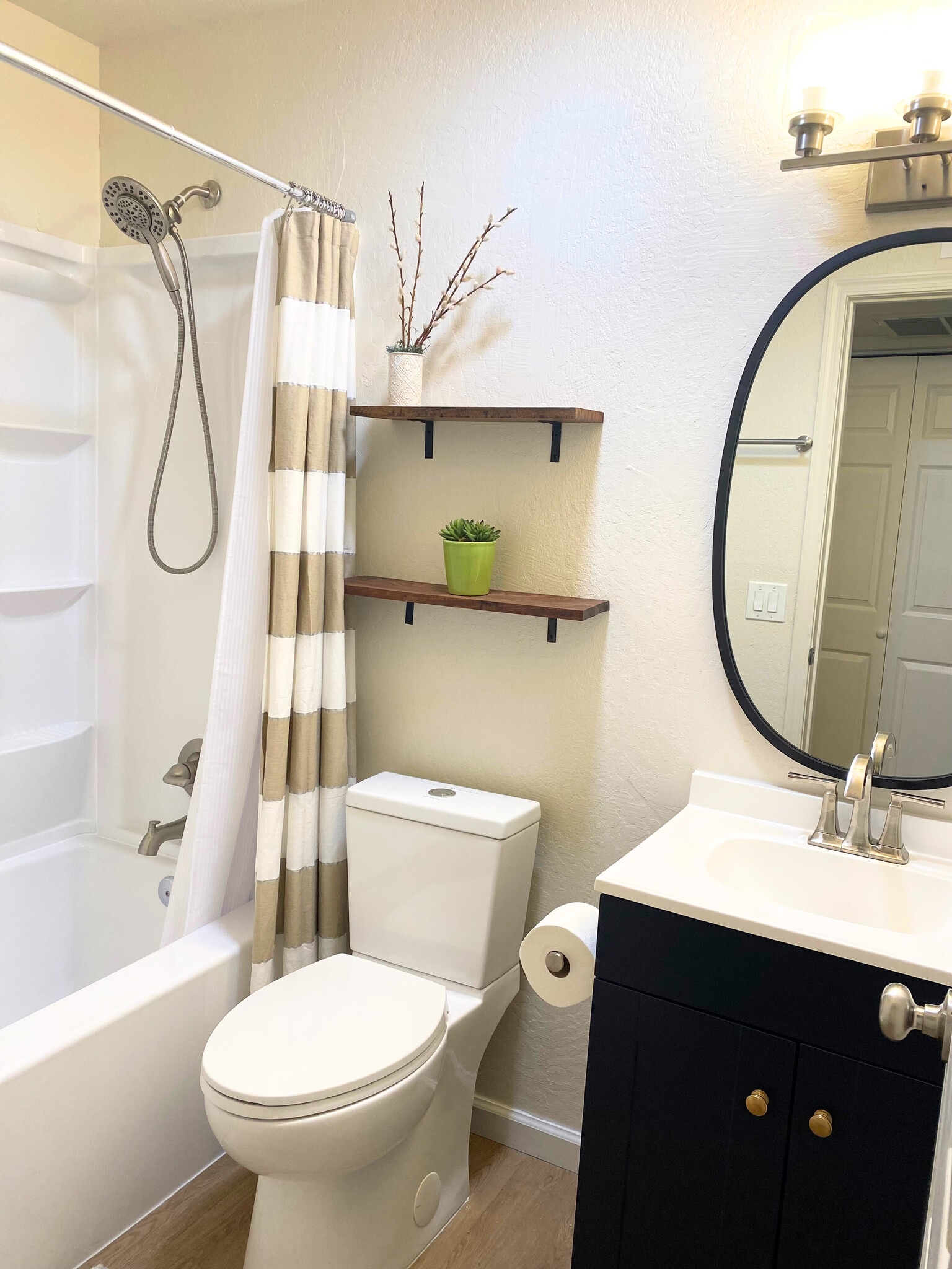 Tub-shower combo—perfect for a quick refresh or a relaxing soak. - 1795 W 28th St