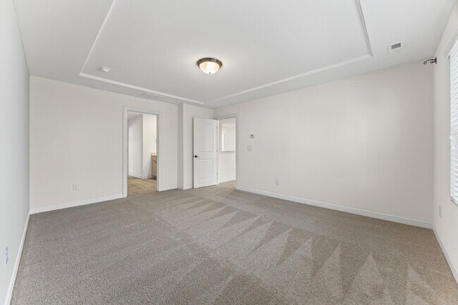 Building Photo - Classic finishes paired with an open, versatile layout!