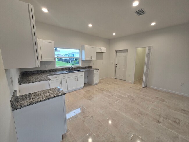 Building Photo - BRAND NEW 3/2/1 -SW LEHIGH ACRES FL