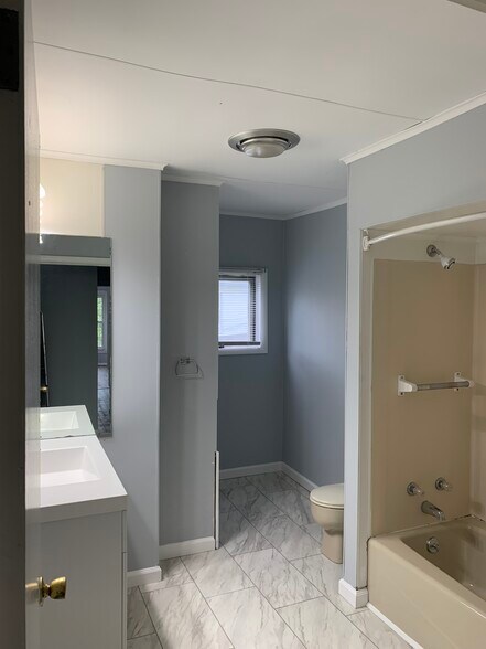 155 Full bath with new tile flooring/Second Floor - 155 Main St