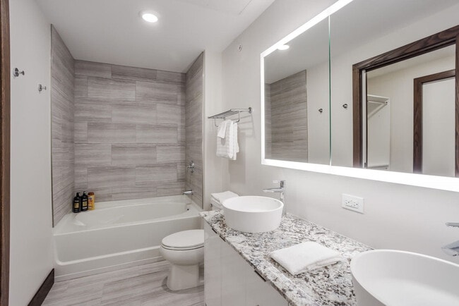 Building Photo - 9-JAN-JAN E 4th St