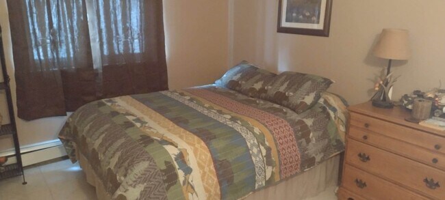 One Bedroom, full bed. Dresser and nightstand. - 4 Bay Pl