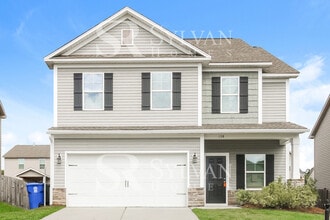 Building Photo - Prepare to fall in love with this 4 bedroom, 2.5 bathroom home