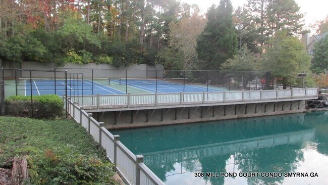 Building Photo - ENJOY THIS BEAUTIFUL CONDO NESTLED IN THE ...