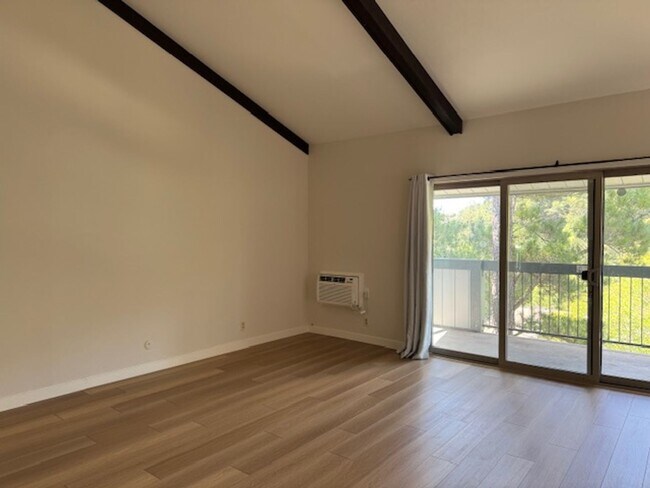 Building Photo - Spacious Two story 2 bedroom, 2 bath Condo. Move-In ready!!