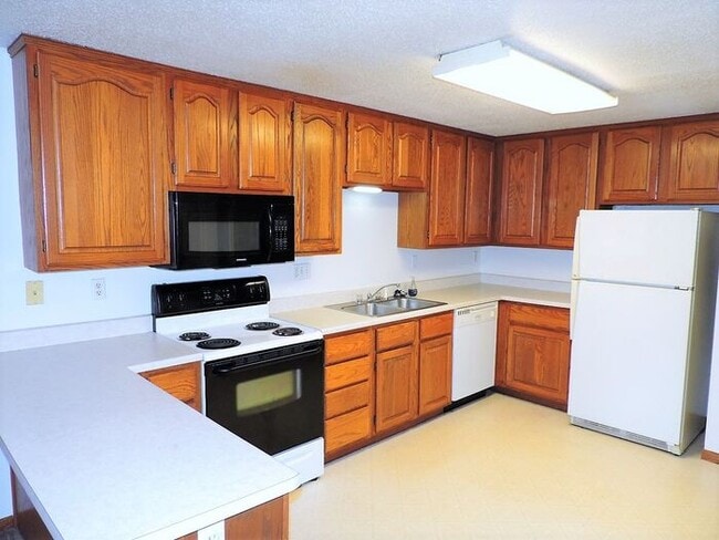 Building Photo - $1,250 | 2 Bedroom, 1 Bathroom Condo | Pet Friendly* | Available for an August 7th, 2026 Move In!