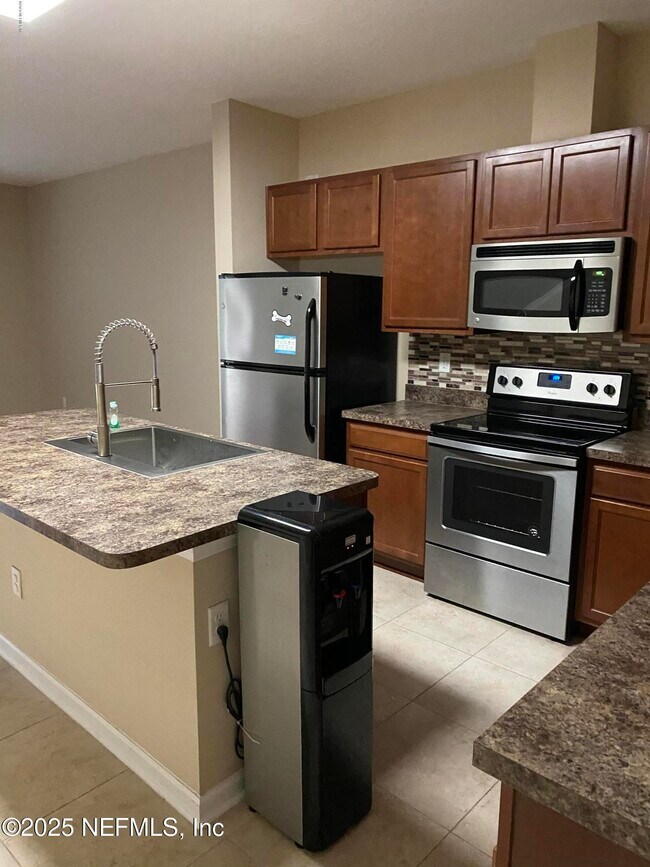 Building Photo - 4220 Plantation Oaks Blvd