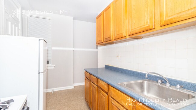 Building Photo - 1355 W Estes Ave