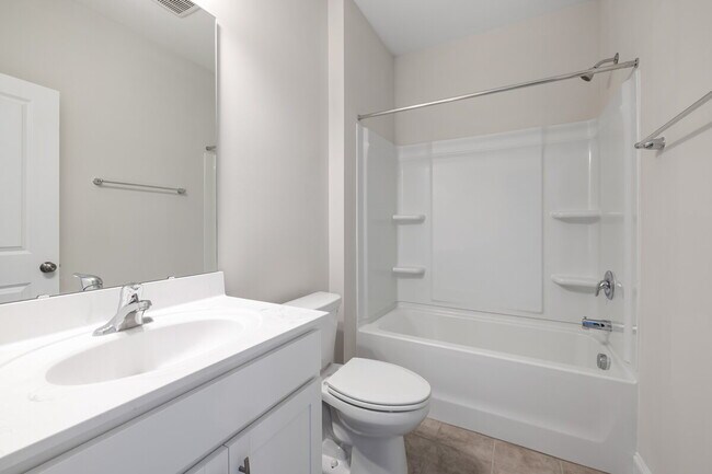 Building Photo - Available 08/15! Spacious Townhome in Prime Andrew Chapel Community