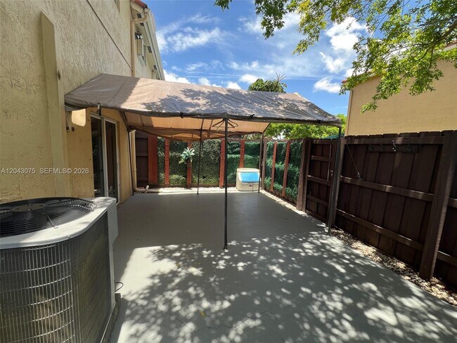 Building Photo - 6975 NW 173rd Dr