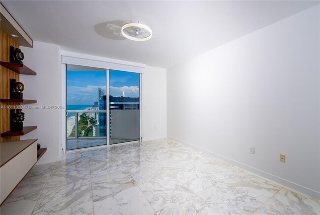 Building Photo - 6365 Collins Ave