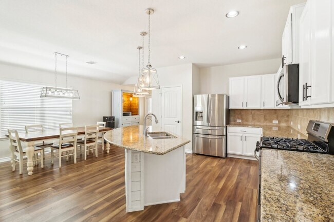 Building Photo - "Charming 4-Bedroom Oasis with custom fini...