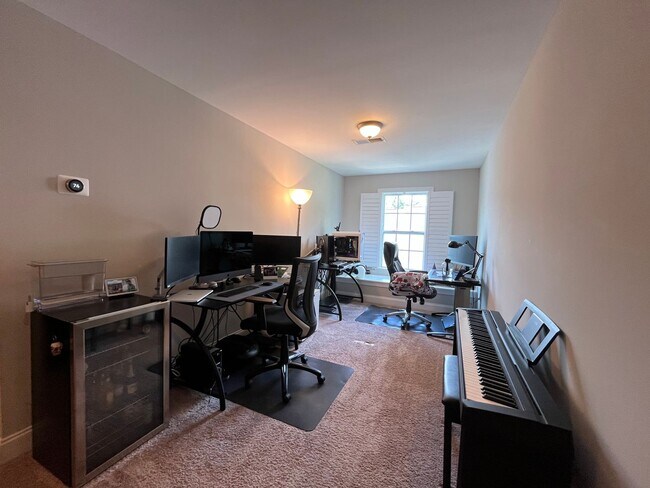 Building Photo - Exceptional 4BD, 2.5BA Cary Townhome with 2-Car Garage, Bonus 2nd Floor Living Space, and Private...