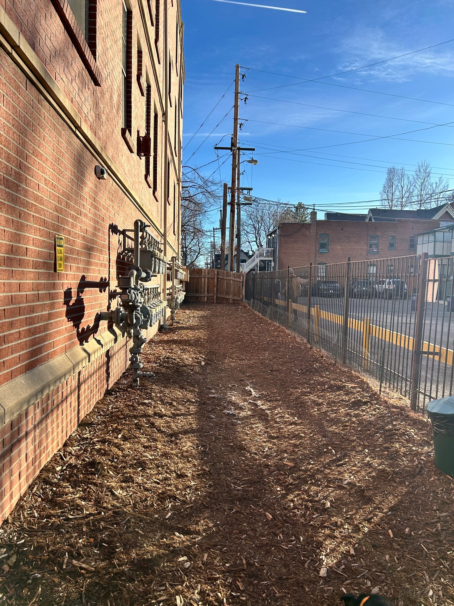 Dog Run on the side of the gated building - 1699 N Downing St