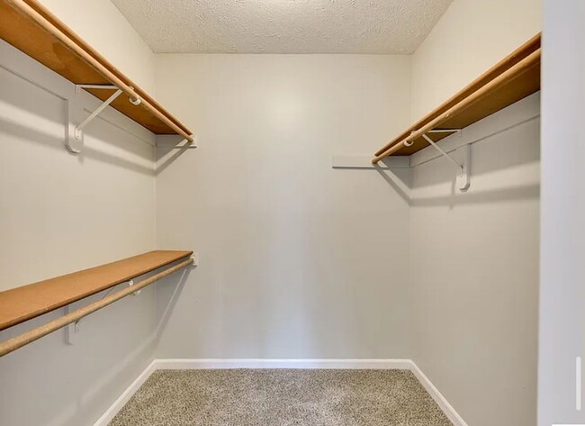 Building Photo - Spacious Corner Townhome with Private Yard...