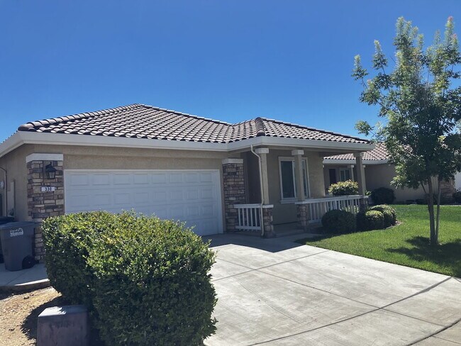 Primary Photo - Spacious 4-Bedroom, 2-Bath Rental Home – M...