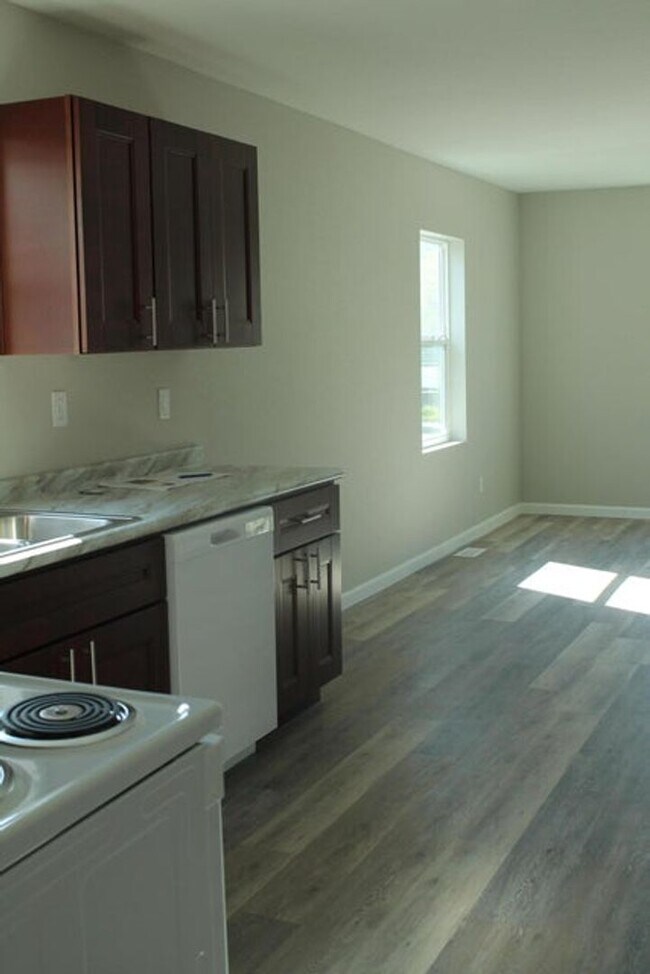 Building Photo - Modern Charm Meets Prime Location!