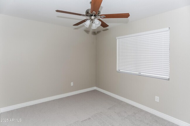 Building Photo - 8880 W Greer Ave
