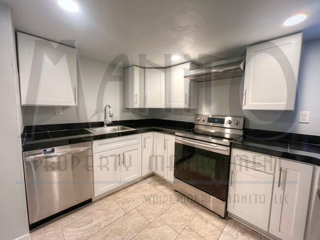 Building Photo - Garland Triplex