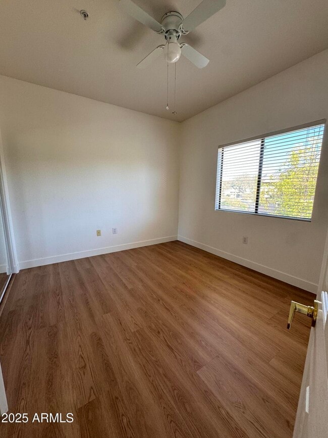 Building Photo - 9555 E Raintree Dr